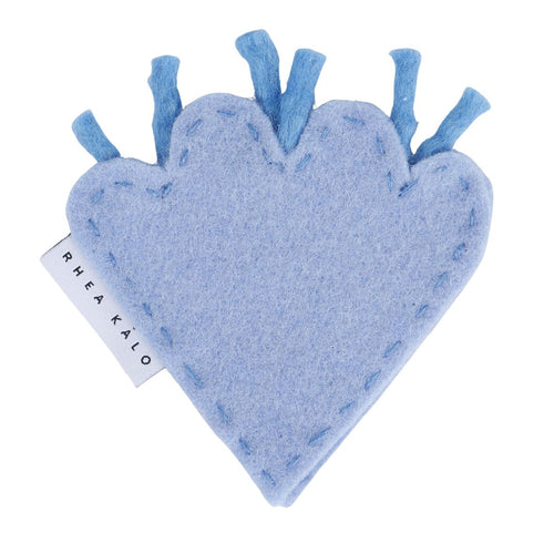 Handmade ceramic napkin ring with blue shell design by Rhea Kalo, made in Athens