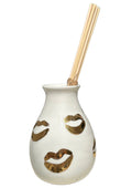 Handmade ceramic reed diffuser with gold kiss design by Rhea Kalo Athens