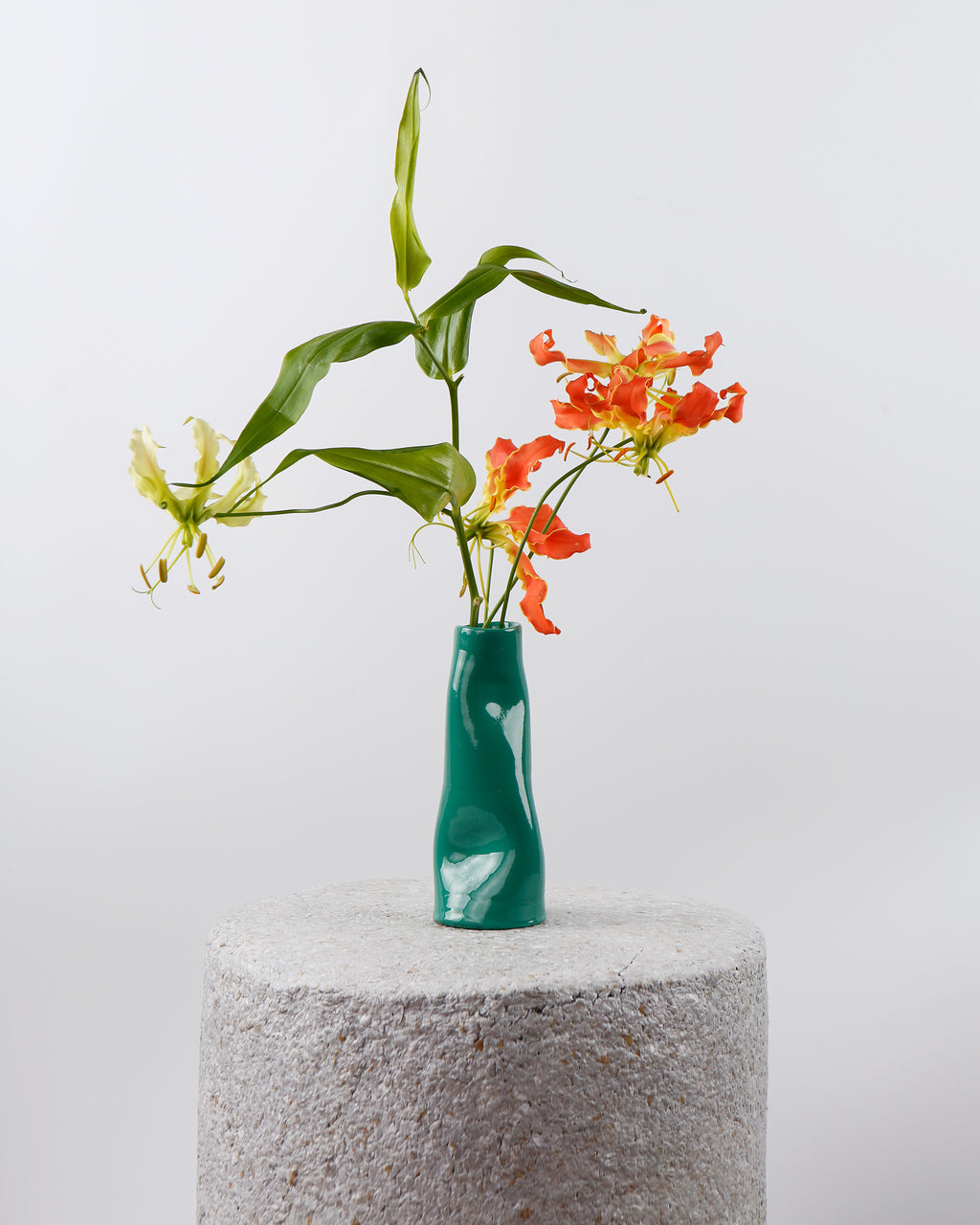 Squashed green resin vase